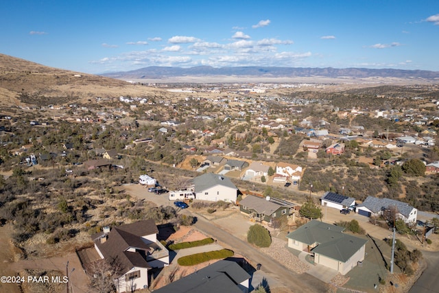 birds eye view of property featuring a mountain view