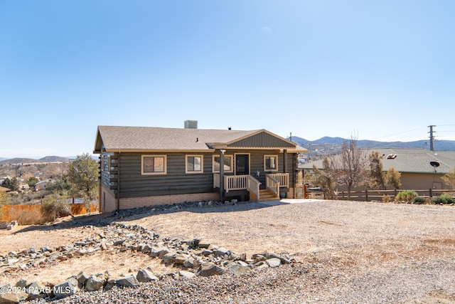 view of front of house featuring a mountain view