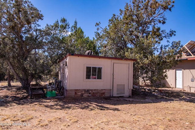 view of outbuilding with an outbuilding