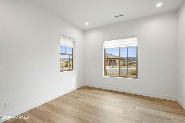 1148 S Lakeview Dr, Prescott, AZ 86301 - spare room with light wood-type flooring, visible vents, baseboards, and recessed lighting