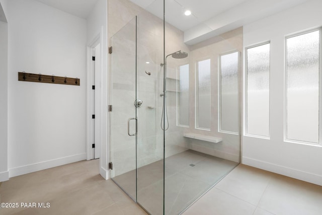 1148 S Lakeview Dr, Prescott, AZ 86301 - bathroom with tile patterned floors, baseboards, and a tile shower