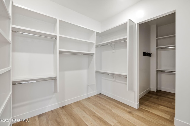 1148 S Lakeview Dr, Prescott, AZ 86301 - spacious closet featuring wood finished floors