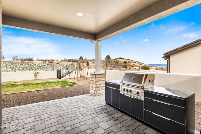1148 S Lakeview Dr, Prescott, AZ 86301 - view of patio / terrace with a mountain view, area for grilling, and a grill