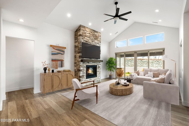 1148 S Lakeview Dr, Prescott, AZ 86301 - living room featuring wood finished floors, high vaulted ceiling, a fireplace, recessed lighting, and ceiling fan
