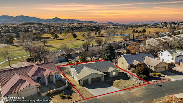 942 N Latigo Ln, Dewey-Humboldt, AZ 86327 - aerial view of residential area featuring a mountainous background and property parcel outlined