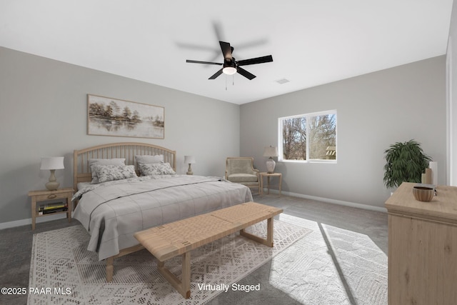 bedroom with visible vents, baseboards, a ceiling fan, and carpet flooring