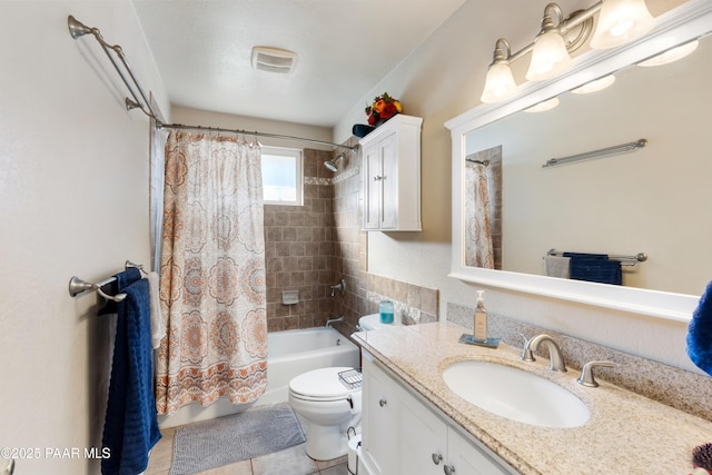 full bathroom featuring toilet, vanity, shower / bath combo, and tile patterned flooring