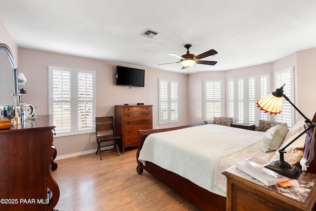 bedroom featuring ceiling fan and light wood-type flooring