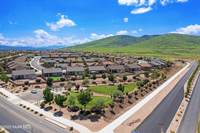 drone / aerial view featuring a mountain view