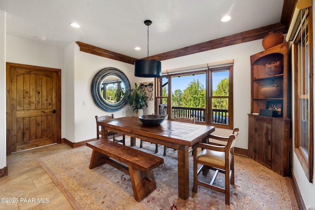 dining space featuring recessed lighting, baseboards, and ornamental molding