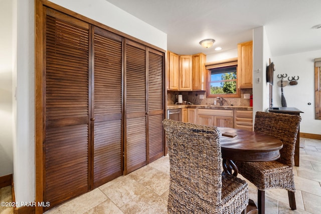 dining room with baseboards