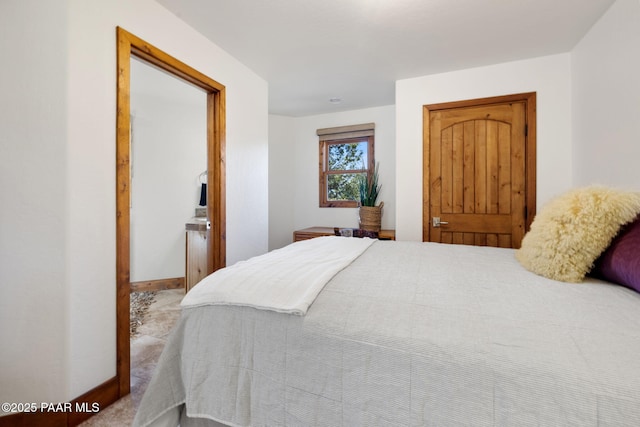 bedroom with baseboards