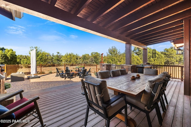 deck featuring outdoor dining space