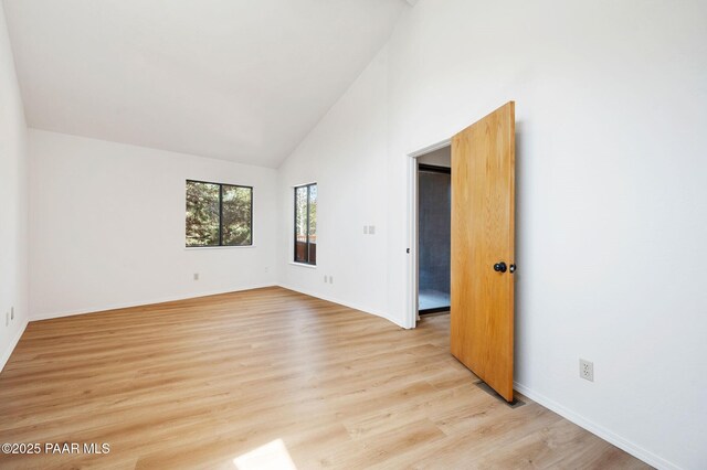 1893 Forest Vw, Prescott, AZ 86305 - spare room with light wood-type flooring, high vaulted ceiling, and baseboards