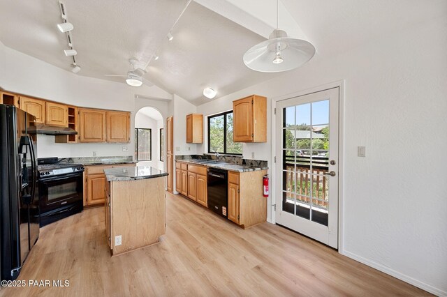 1893 Forest Vw, Prescott, AZ 86305 - kitchen with black appliances, ceiling fan, under cabinet range hood, a center island, and light wood-type flooring