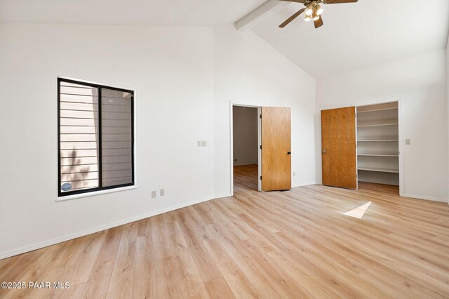1893 Forest Vw, Prescott, AZ 86305 - unfurnished bedroom with beam ceiling, high vaulted ceiling, wood finished floors, a spacious closet, and a ceiling fan