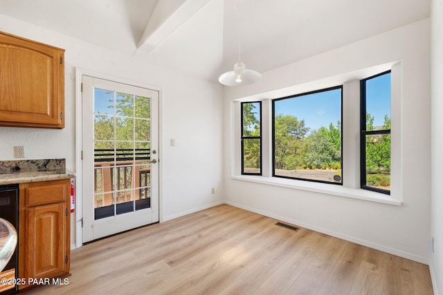 1893 Forest Vw, Prescott, AZ 86305 - unfurnished dining area with light wood finished floors, plenty of natural light, baseboards, and washer / dryer
