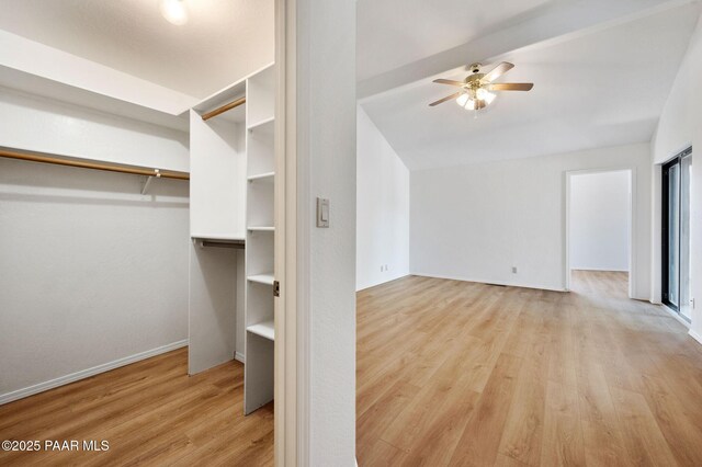 1893 Forest Vw, Prescott, AZ 86305 - spacious closet with wood finished floors, a ceiling fan, and vaulted ceiling