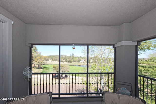 interior space featuring a water view