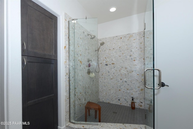 bathroom featuring a shower stall