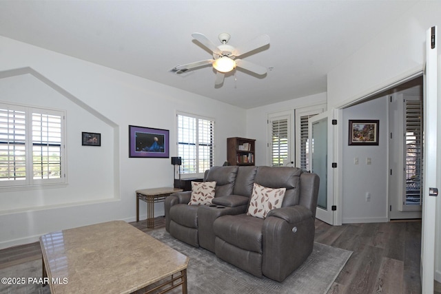living area with ceiling fan, visible vents, baseboards, french doors, and wood finished floors