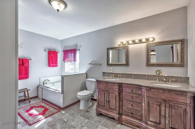 1245 N Windmill Way, Chino Valley, AZ 86323 - bathroom featuring double vanity, a bath, toilet, and baseboards