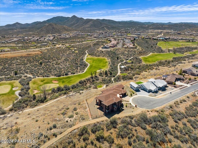 7420 E Reins Ct, Prescott Valley, AZ 86314 - aerial view of property's location featuring a mountainous background, nearby suburban area, and a local golf course