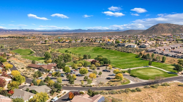 7420 E Reins Ct, Prescott Valley, AZ 86314 - aerial view of residential area with a mountainous background and a local golf course