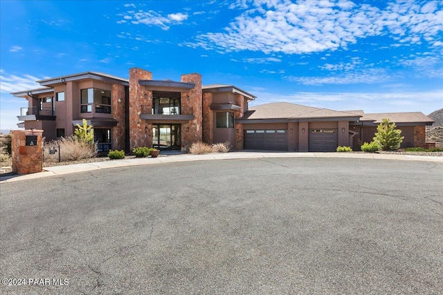 view of front of home with a garage