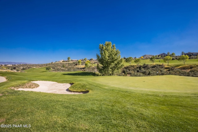 7420 E Reins Ct, Prescott Valley, AZ 86314 - surrounding community with view of golf course and a lawn