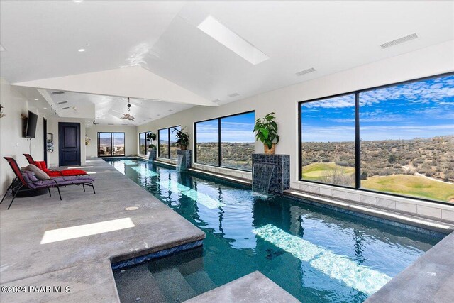 7420 E Reins Ct, Prescott Valley, AZ 86314 - view of swimming pool featuring a skylight and ceiling fan
