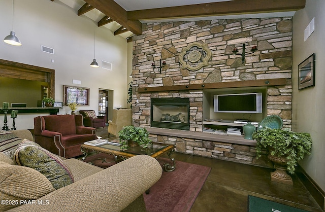 7420 E Reins Ct, Prescott Valley, AZ 86314 - living area featuring high vaulted ceiling, beamed ceiling, and a stone fireplace