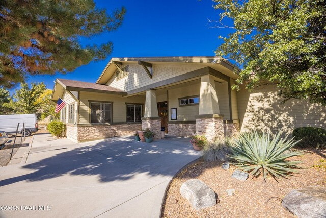 7420 E Reins Ct, Prescott Valley, AZ 86314 - view of front of home featuring stone siding