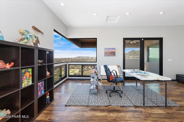 7420 E Reins Ct, Prescott Valley, AZ 86314 - office space featuring a healthy amount of sunlight and dark hardwood / wood-style floors
