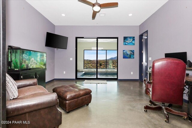 7420 E Reins Ct, Prescott Valley, AZ 86314 - living room with ceiling fan and concrete floors