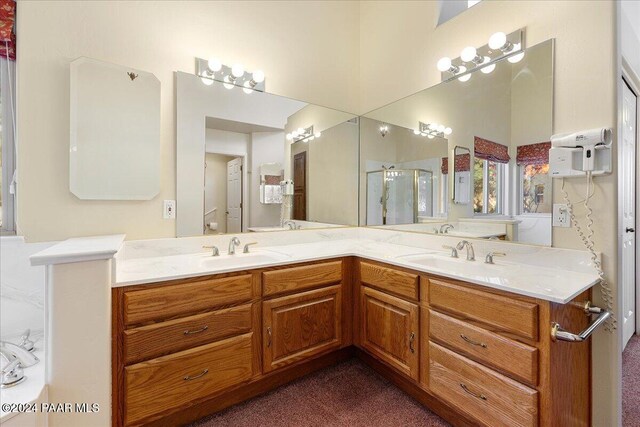 bathroom with vanity and an enclosed shower