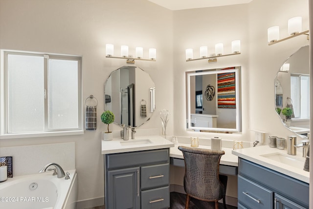 bathroom with a bathtub and vanity