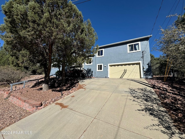 view of front of property featuring a garage