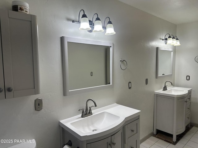 bathroom featuring vanity and tile patterned flooring