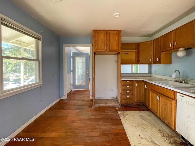532 Canyon Springs Rd, Prescott, AZ 86303 - kitchen with dishwasher, wood finished floors, brown cabinets, and plenty of natural light