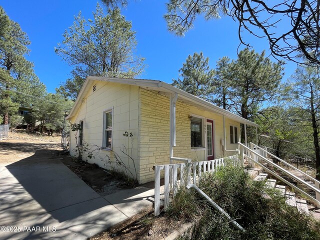 532 Canyon Springs Rd, Prescott, AZ 86303 - view of side of property featuring stairs and covered porch