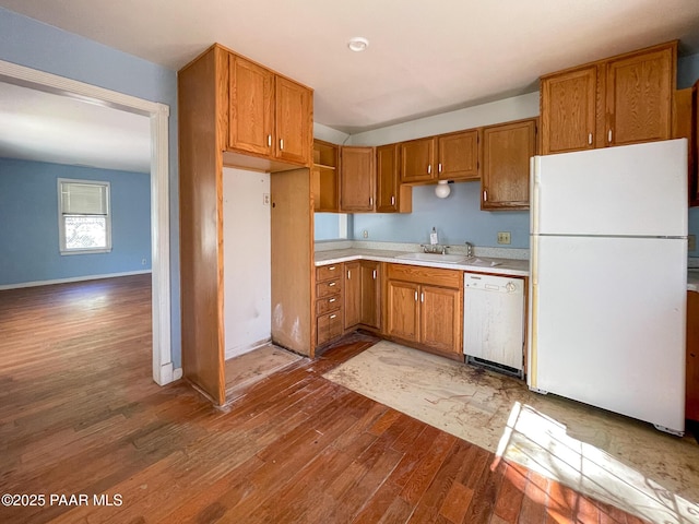 532 Canyon Springs Rd, Prescott, AZ 86303 - kitchen with white appliances, dark wood-style floors, brown cabinetry, and light countertops