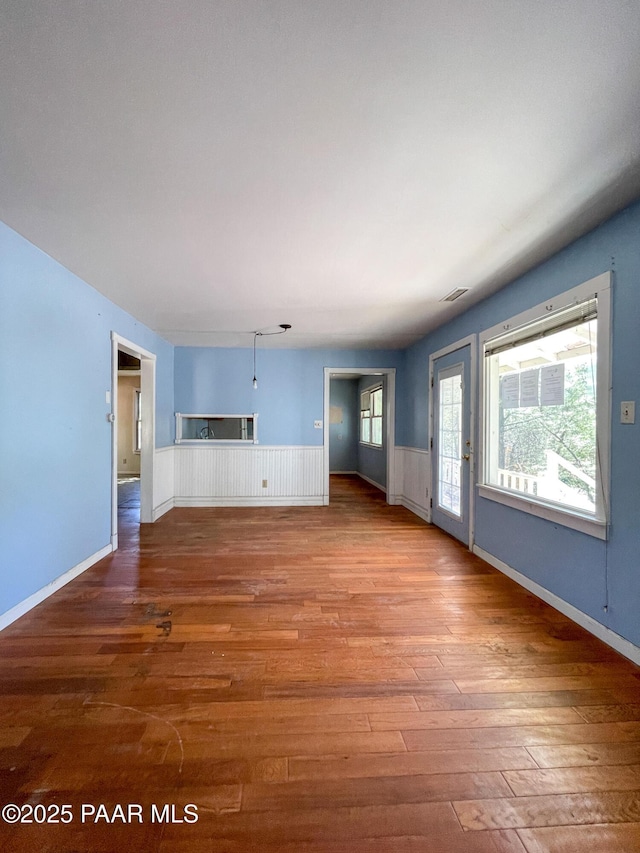 532 Canyon Springs Rd, Prescott, AZ 86303 - unfurnished living room featuring wood finished floors and wainscoting