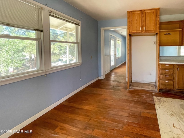 532 Canyon Springs Rd, Prescott, AZ 86303 - kitchen with brown cabinets, dark wood-type flooring, and light countertops