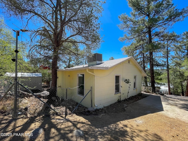 532 Canyon Springs Rd, Prescott, AZ 86303 - view of property exterior featuring a cooling unit and a chimney