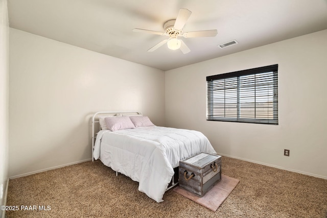 bedroom featuring light colored carpet, visible vents, and baseboards