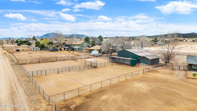 drone / aerial view with a residential view and a mountain view