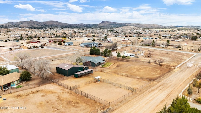 drone / aerial view featuring a mountain view and a residential view