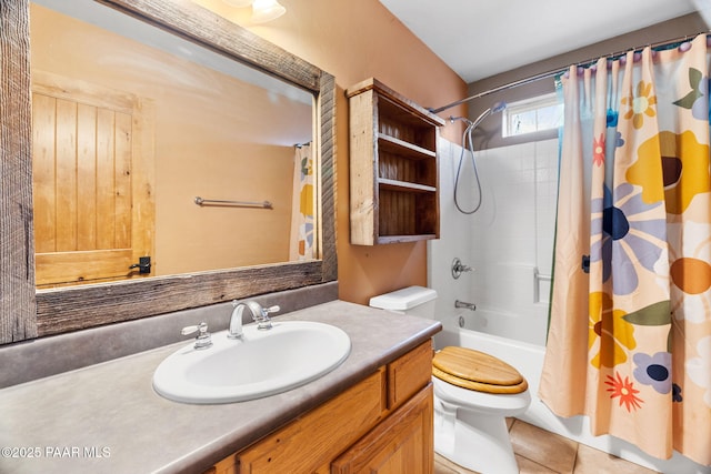 full bathroom with vanity, toilet, tile patterned flooring, and shower / tub combo with curtain