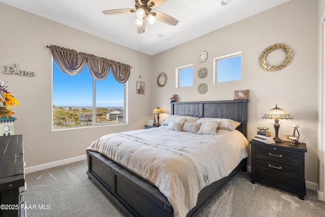 bedroom featuring ceiling fan, baseboards, and carpet flooring